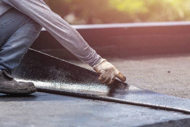 Professional Basement Waterproofing technician working in Bradford, TN